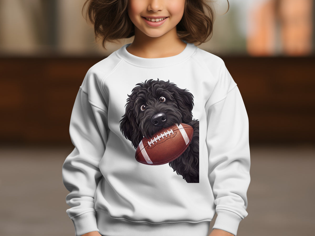 White sweatshirt with a black curly dog holding a football.