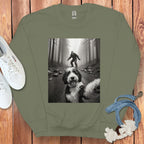 Bigfoot and Dog in Forest Graphic Sweatshirt