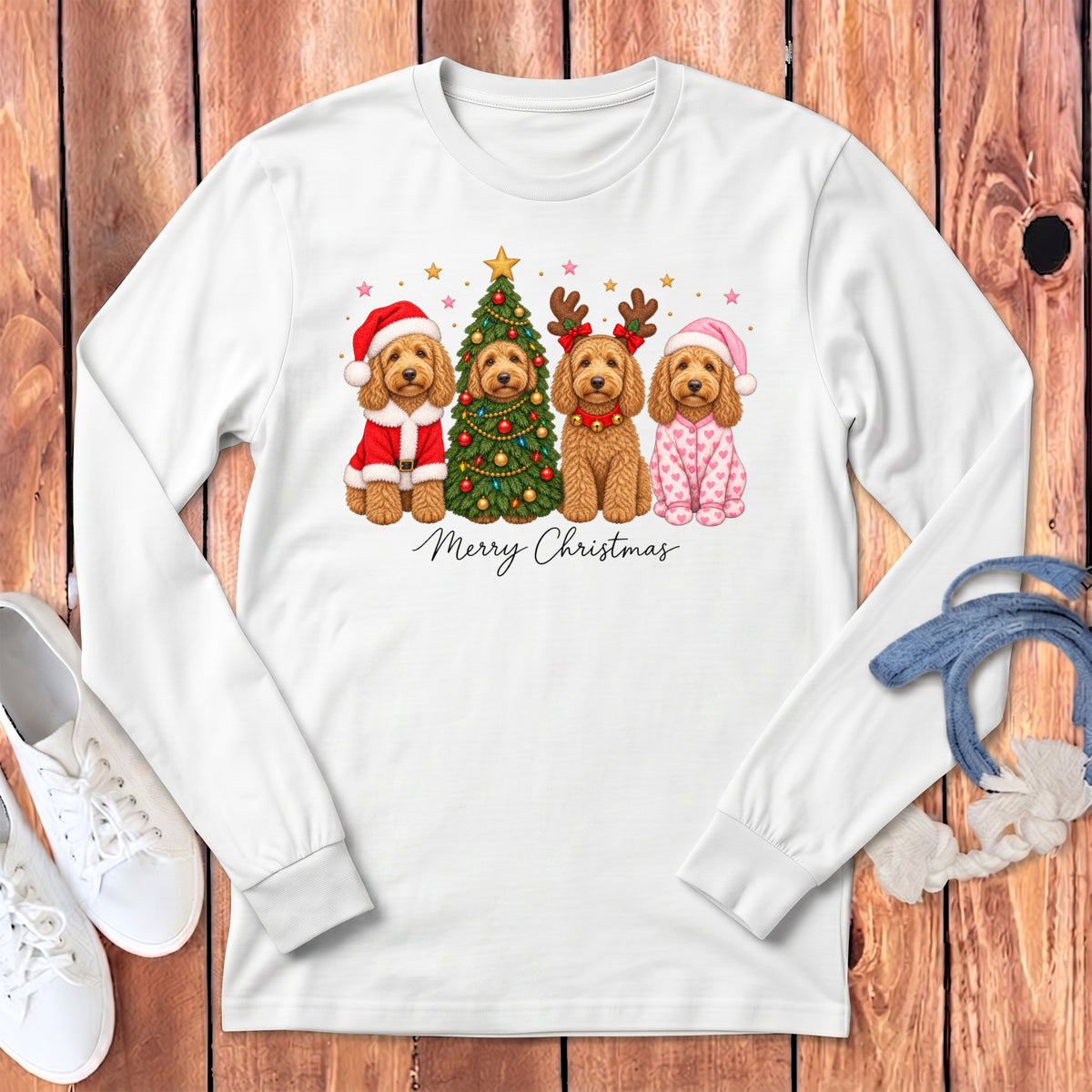 White long-sleeve t-shirt featuring a Christmas graphic of four goldendoodle dogs and the text Merry Christmas.