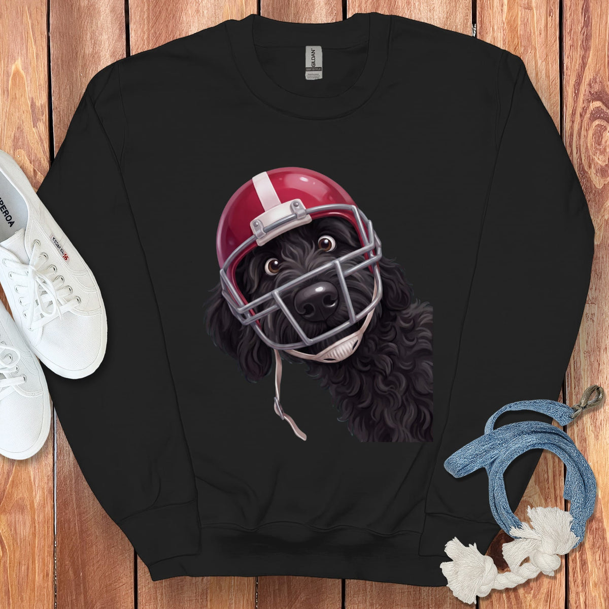 Black sweatshirt with a cartoon black dog wearing a red football helmet.