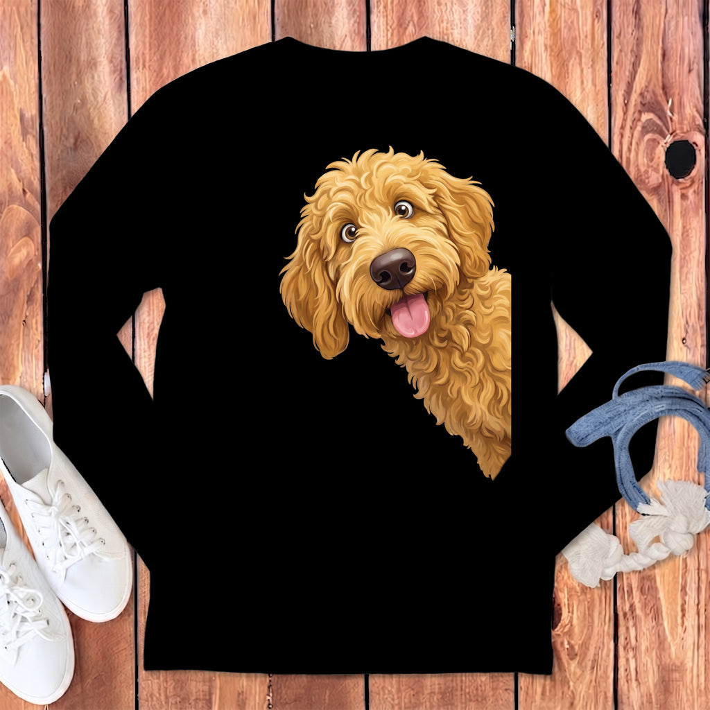 A black long-sleeve sweatshirt featuring a graphic of a happy, fluffy golden doodle peeking from the center.