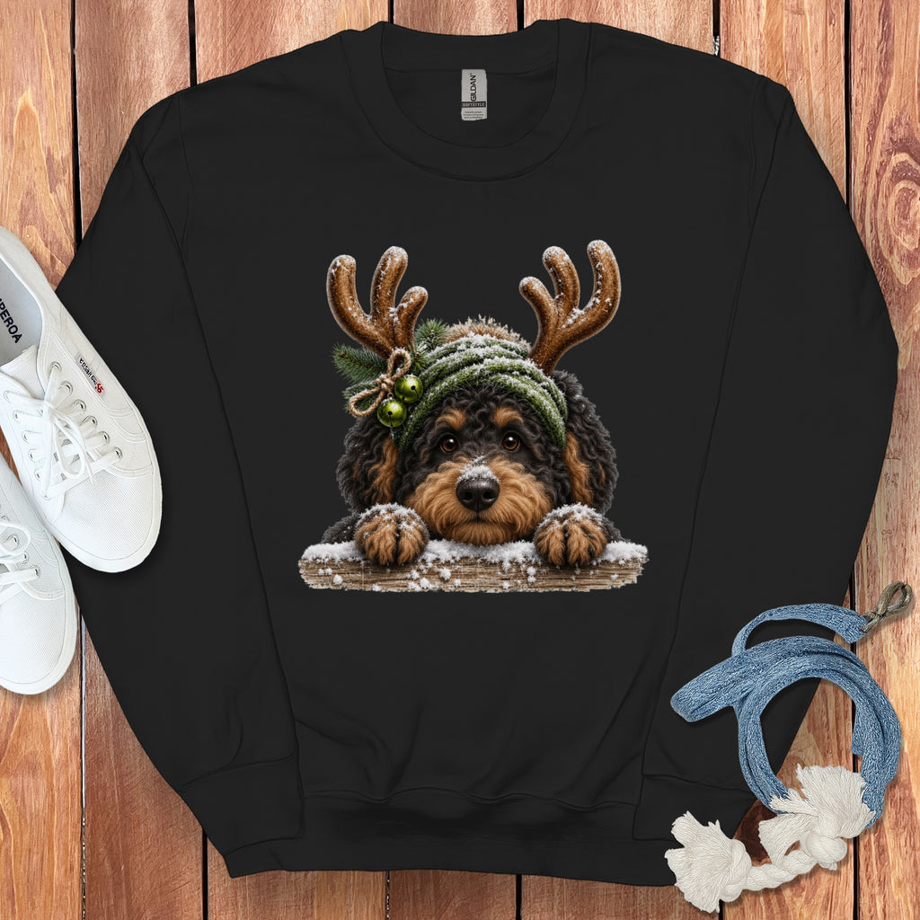 Black sweatshirt with festive dog wearing antlers and a green hat.