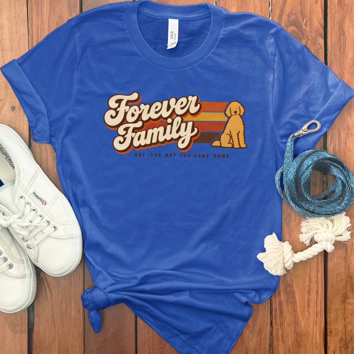 Blue t-shirt with retro "Forever Family" text and a goldendoodle graphic.