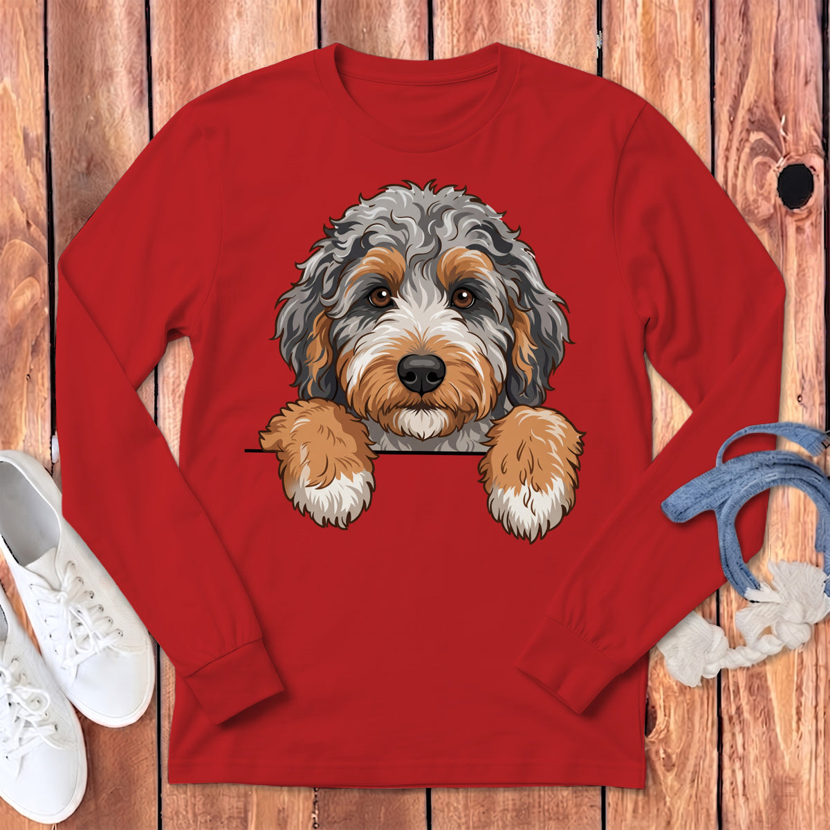 Red long-sleeve shirt with a cartoon Bernedoodle dog illustration.