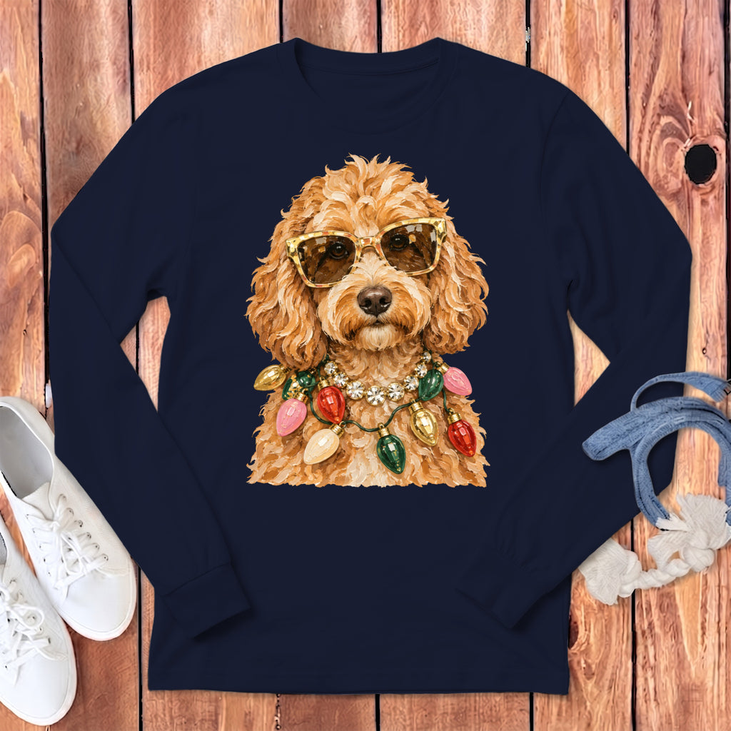 Golden doodle wearing sunglasses and a Christmas light necklace on a navy shirt.