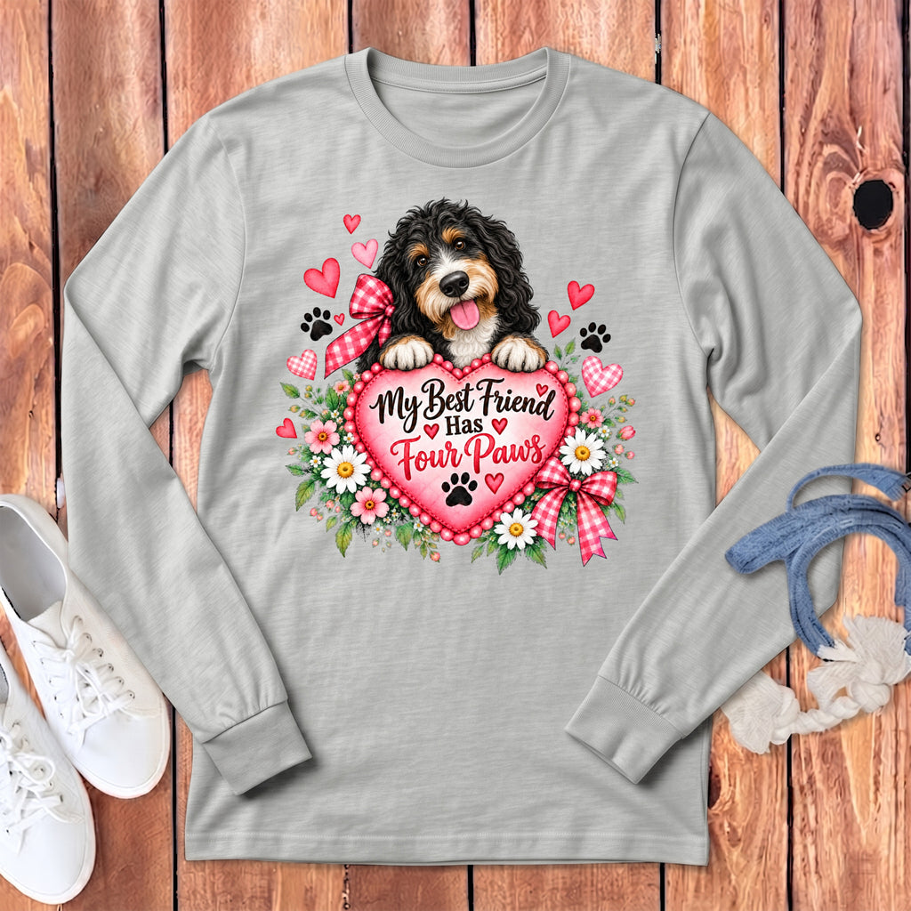 Gray long-sleeve t-shirt featuring a bernedoodle puppy holding a pink heart with flowers and text.