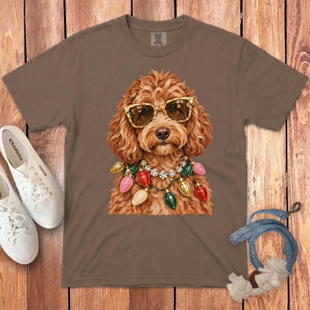 Brown t-shirt featuring a doodle dog wearing sunglasses and a string of Christmas lights.