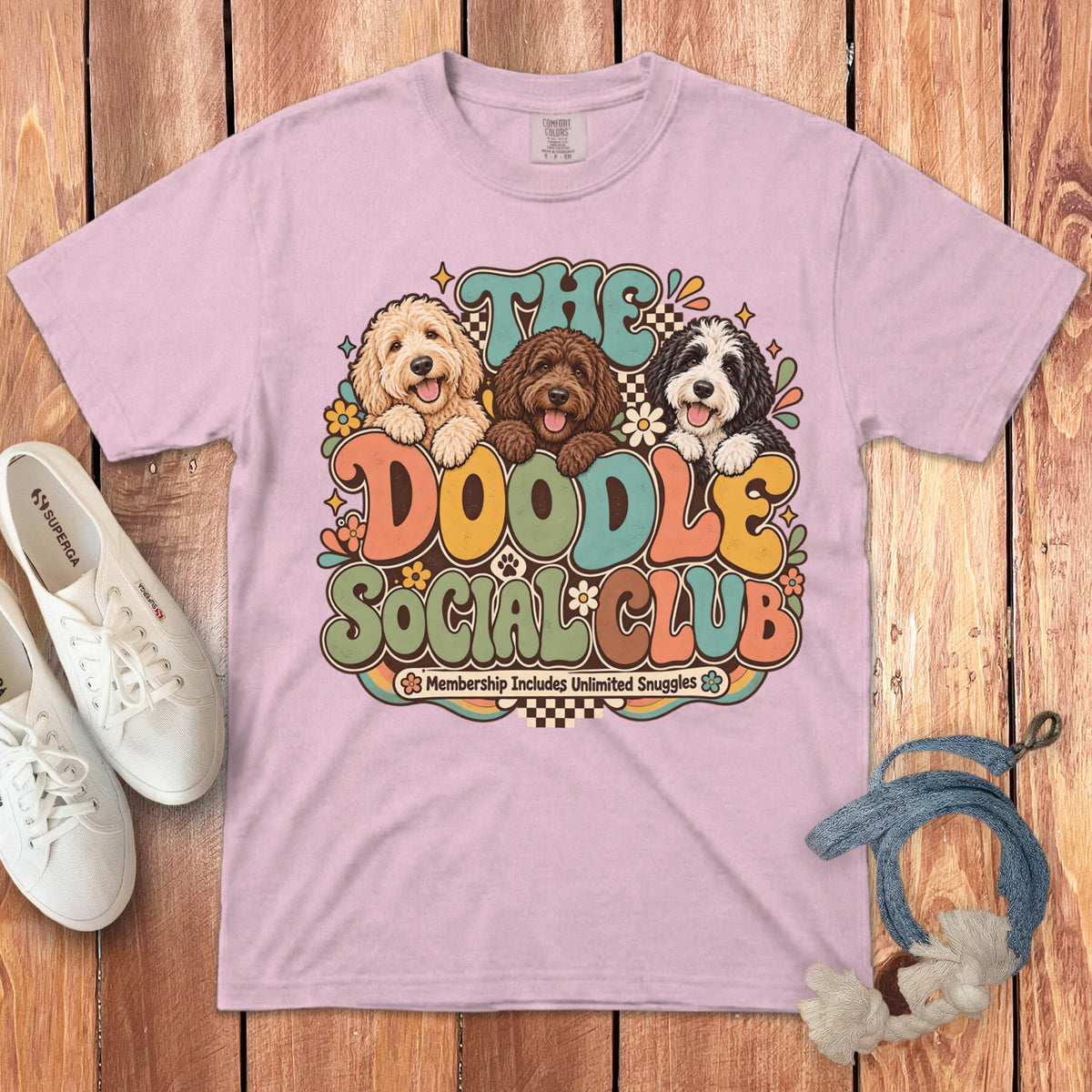 Light pink t-shirt with three doodle dogs and "The Doodle Social Club" text.