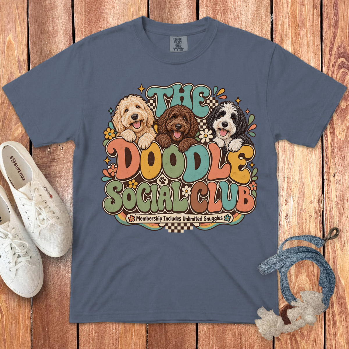 T-shirt with three doodles and the text "The Doodle Social Club Membership Includes Unlimited Snuggles".