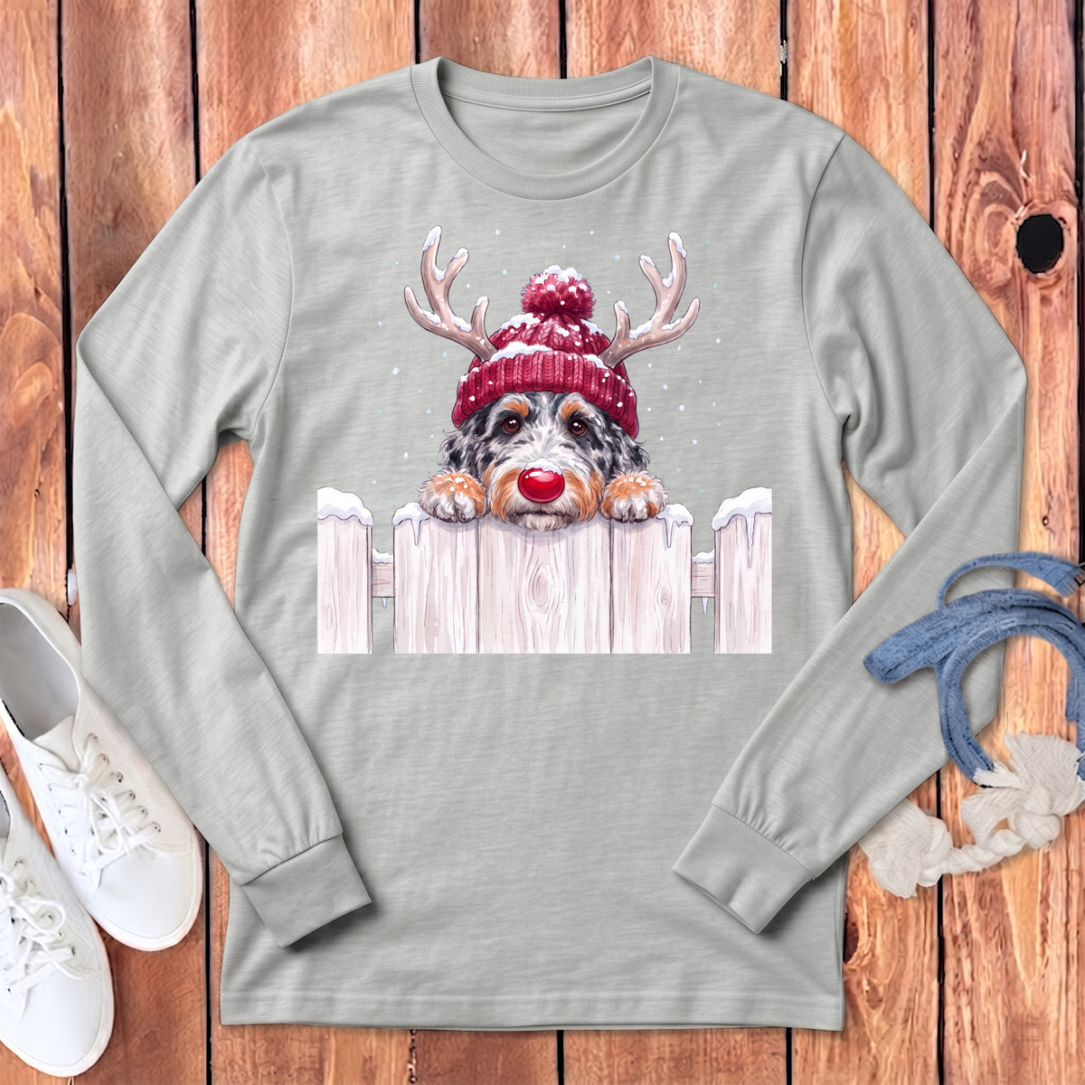 Long sleeve shirt with a doodle dog wearing a Santa hat and antlers.