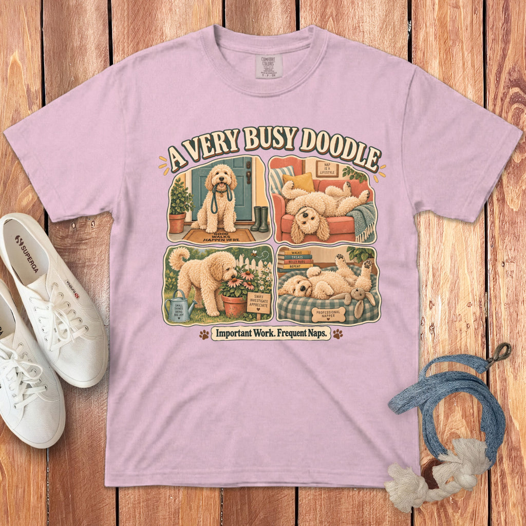 Pink t-shirt with "A VERY BUSY DOODLE" and four doodle illustrations.