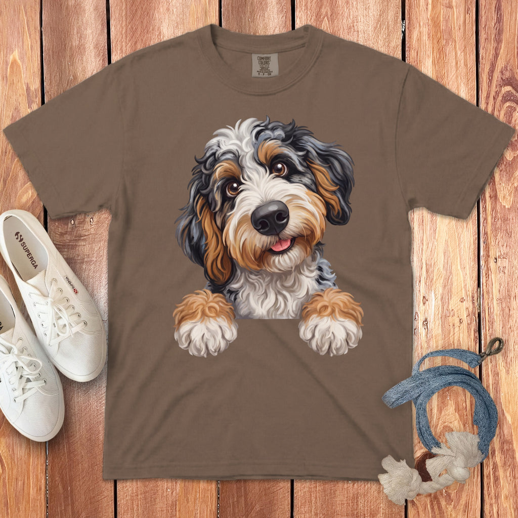 Brown t-shirt with a printed Bernedoodle dog peeking over the collar.