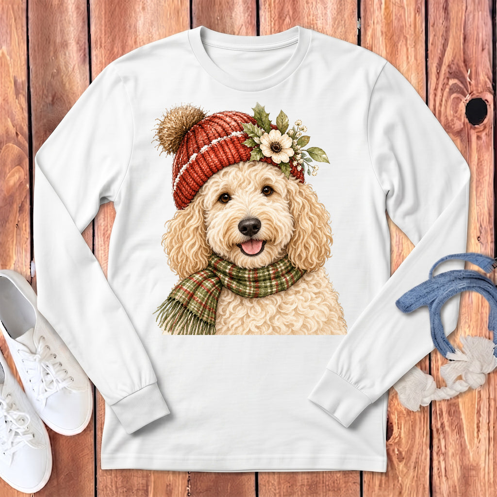 White long-sleeve shirt with a watercolor doodle dog wearing a red beanie and scarf.