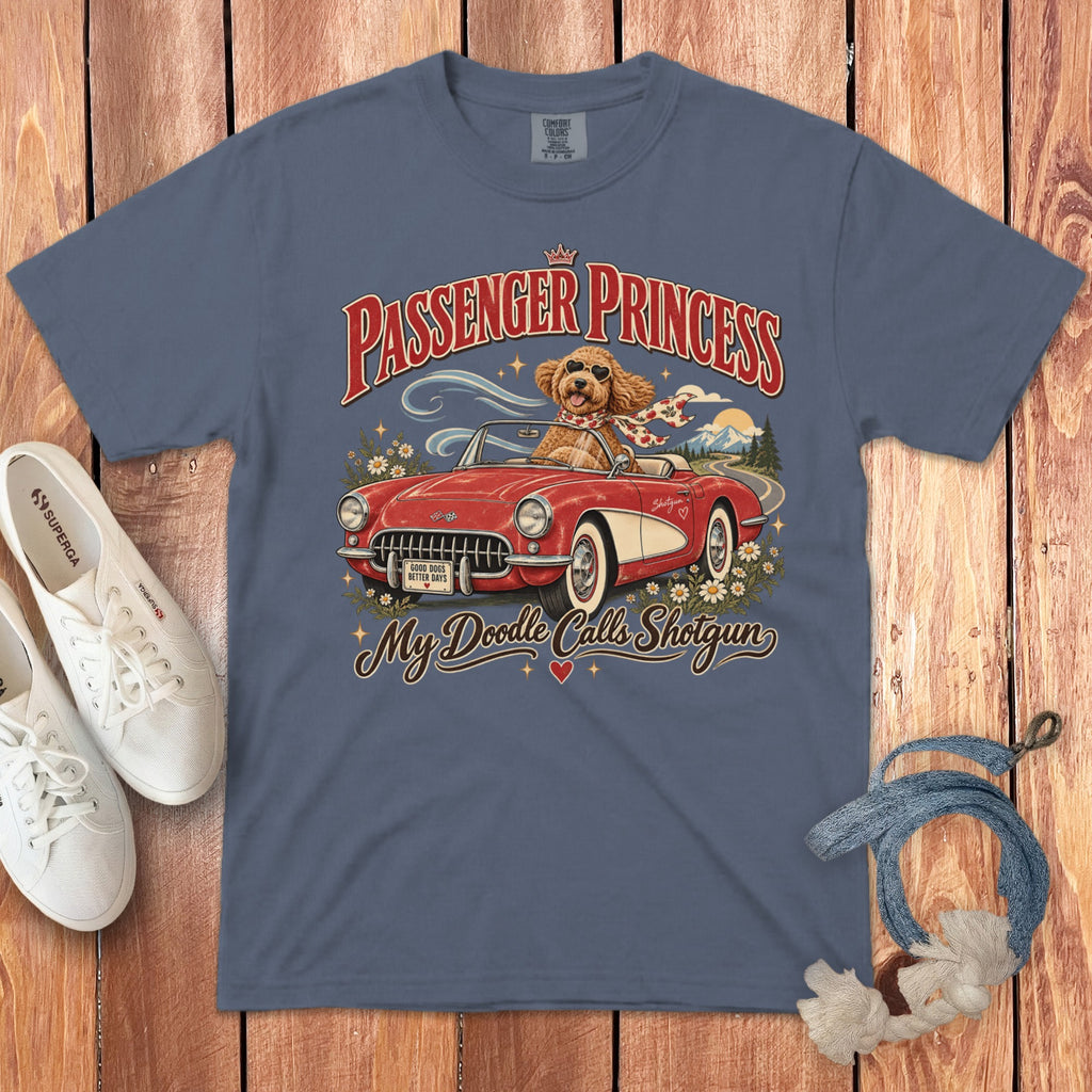 Doodle wearing heart sunglasses rides in a red convertible with "Passenger Princess" text.