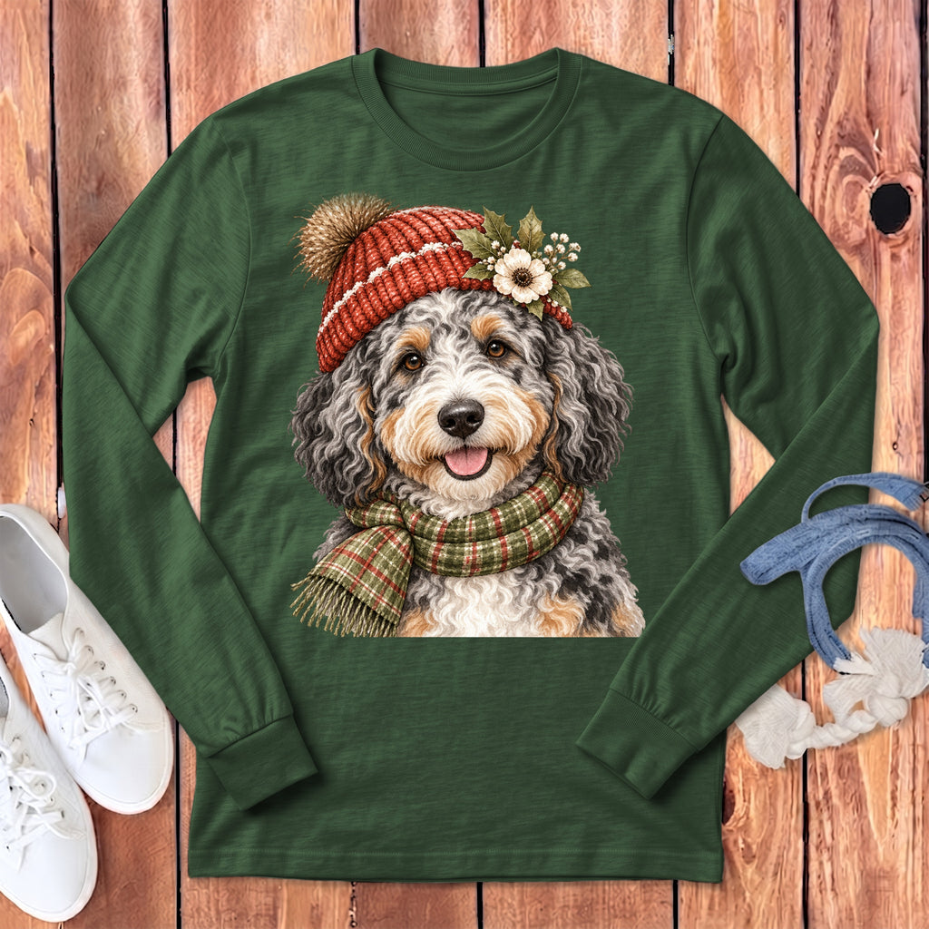 Green long-sleeve shirt with a watercolor portrait of a dog wearing a festive hat and scarf.