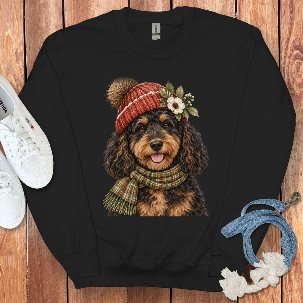 Black sweatshirt with a cute dog wearing a hat and scarf graphic.