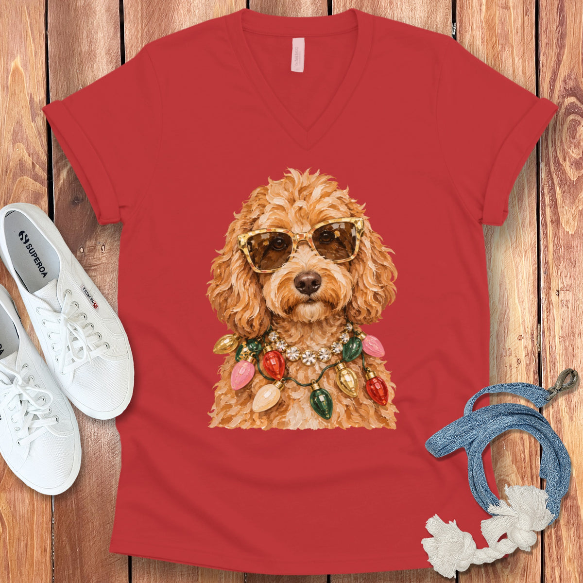 Red v-neck shirt with a golden-doodle wearing sunglasses and a Christmas light necklace.