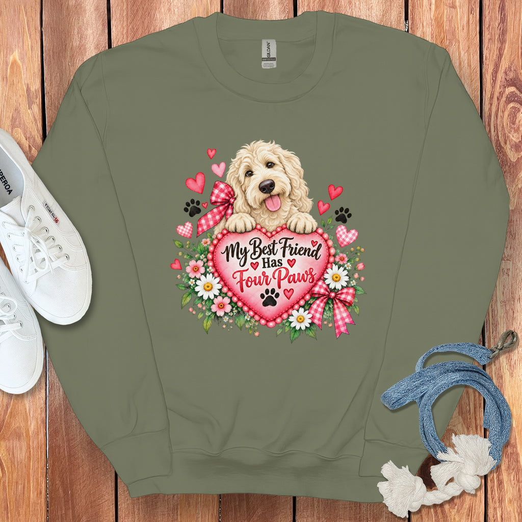Olive green crewneck sweatshirt featuring a cute fluffy dog holding a heart with text My Best Friend Has Four Paws surrounded by flowers.