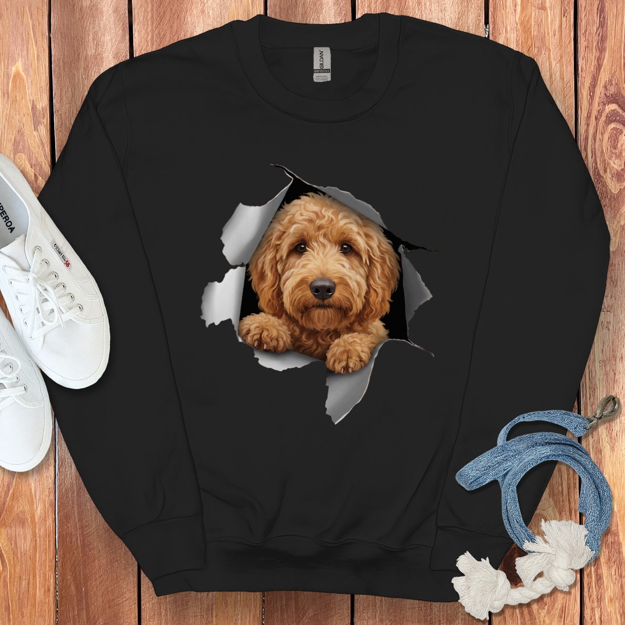 Cute Dog Peeking Through Ripped Black Sweatshirt Product