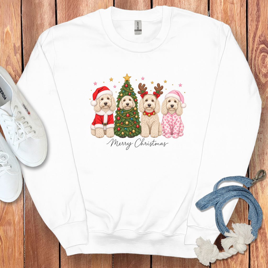 White crewneck sweatshirt with a graphic of four doodle dogs celebrating Christmas and the text Merry Christmas.