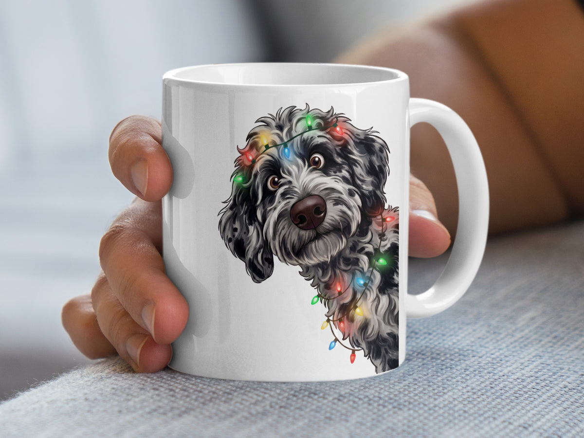 White mug with dog illustration wearing Christmas lights.