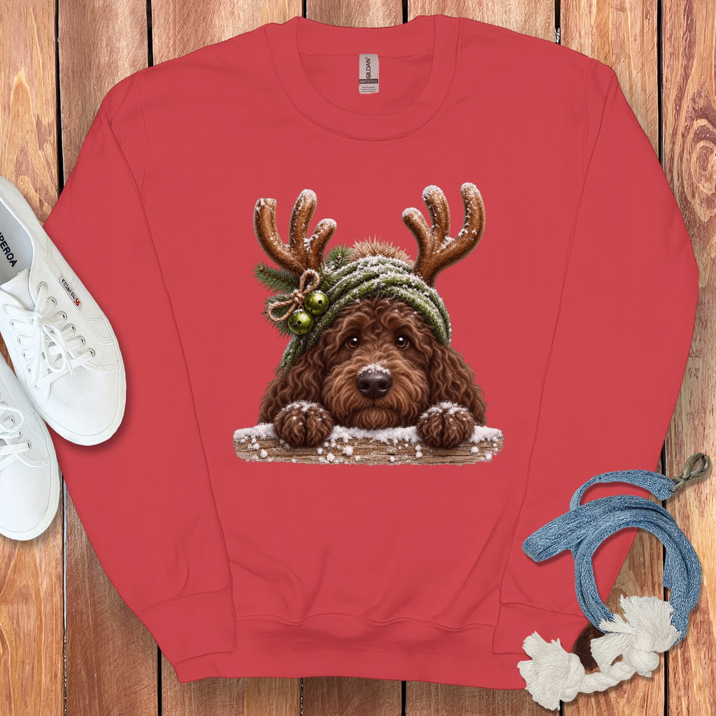 Red sweatshirt with a Christmas dog graphic and a Gildan tag.