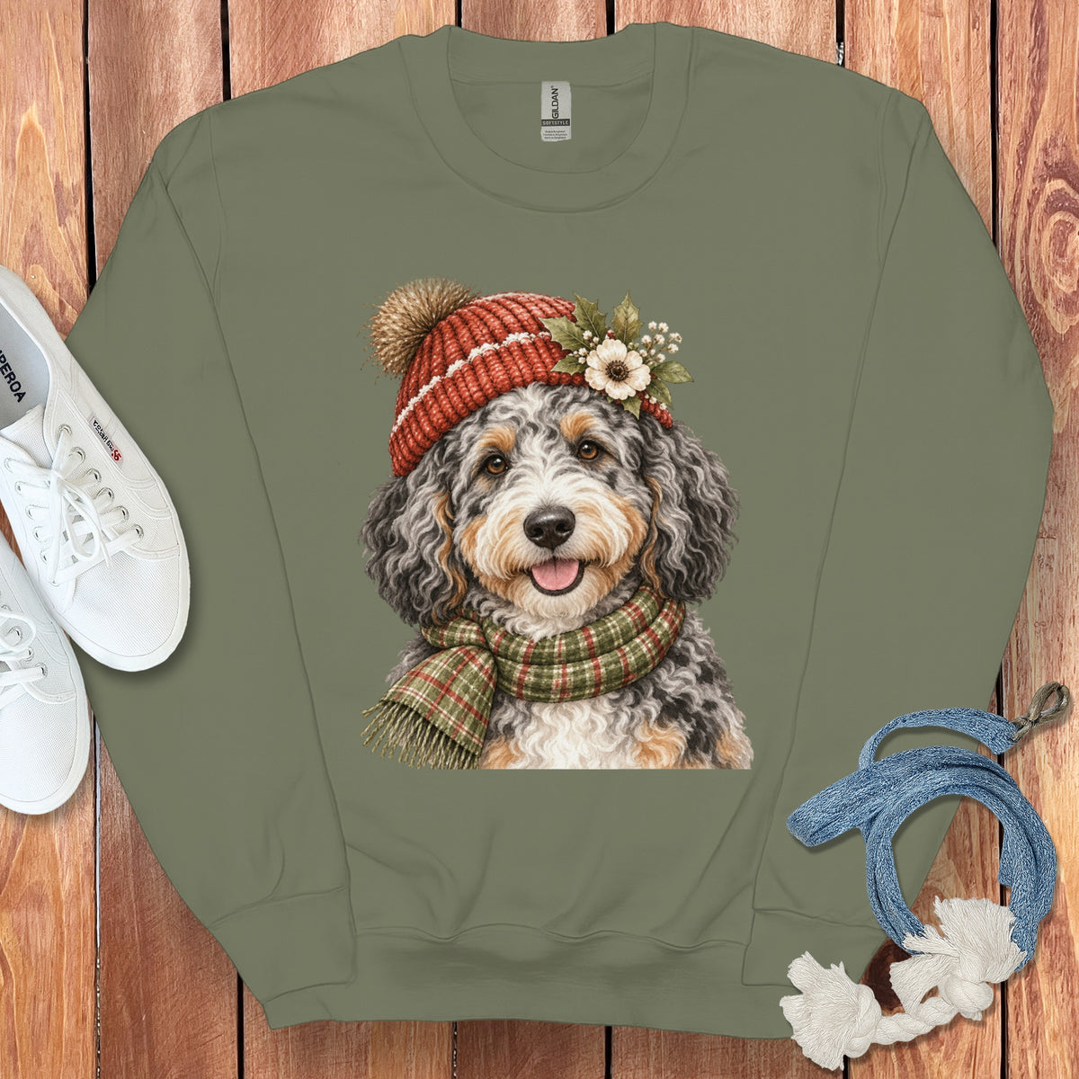 Crewneck sweatshirt with a watercolor doodle dog wearing a winter hat and scarf.