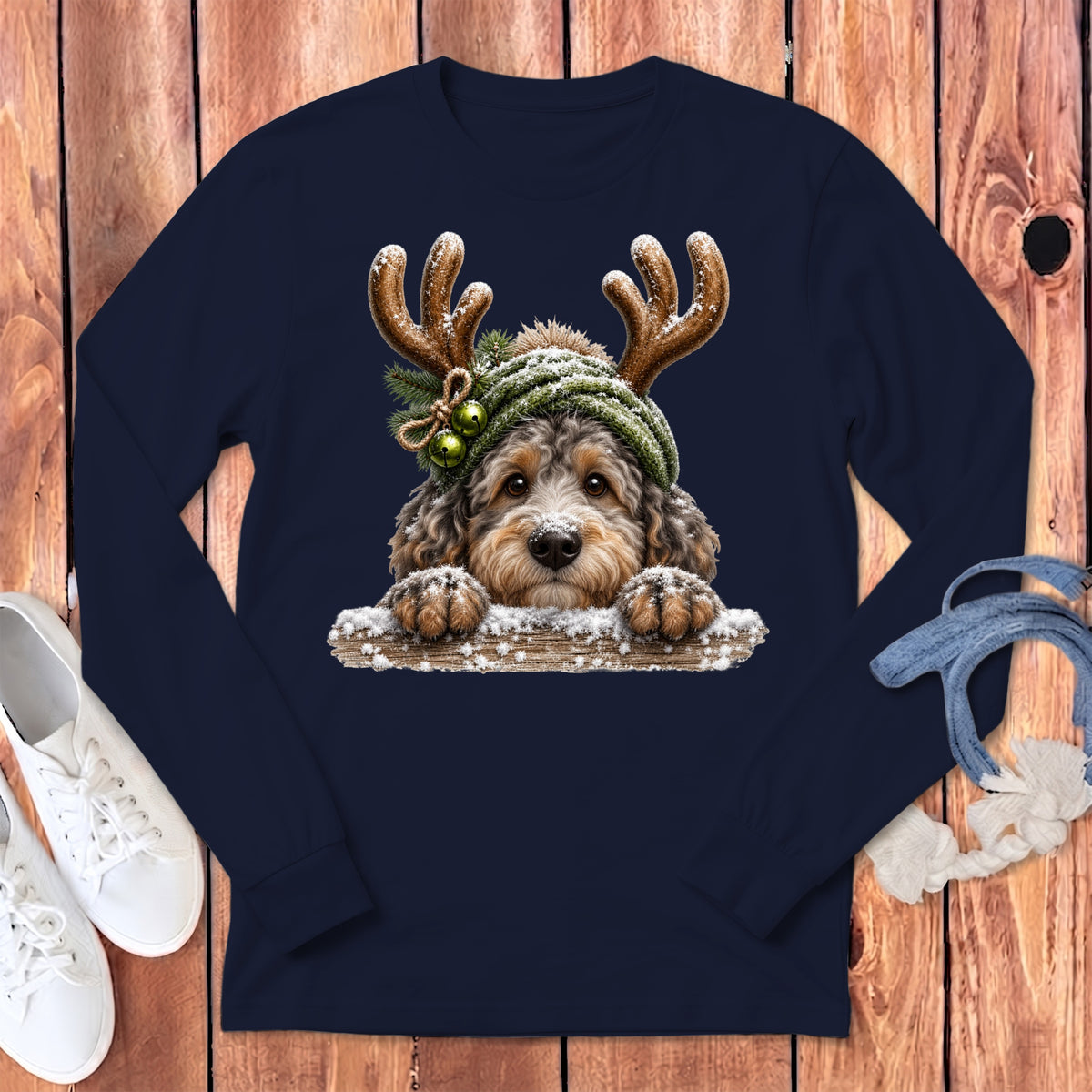 Dark navy long-sleeve shirt with a cartoon dog wearing antlers and a winter hat.