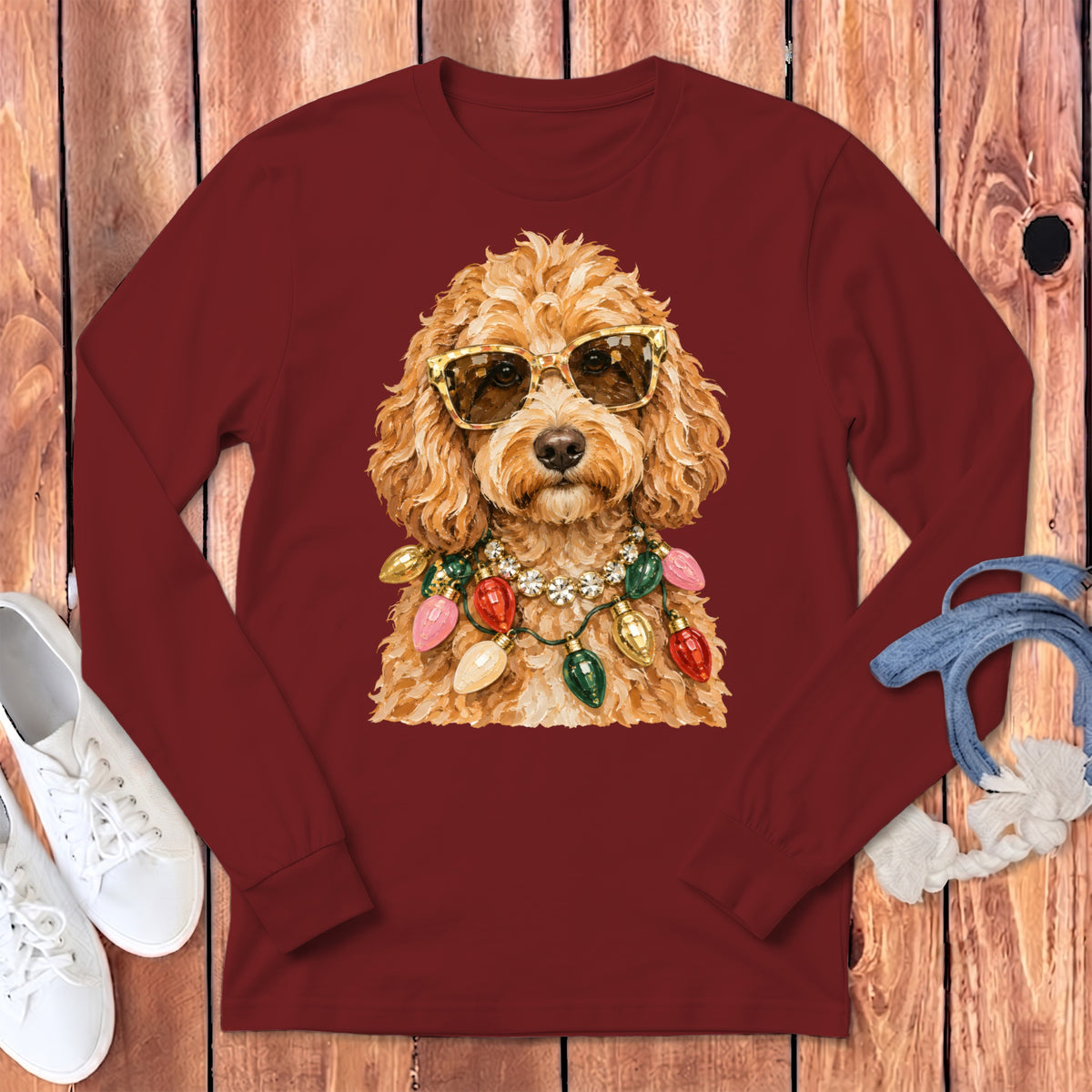 Maroon long-sleeve shirt with a golden-sunglasses wearing dog and Christmas lights design.