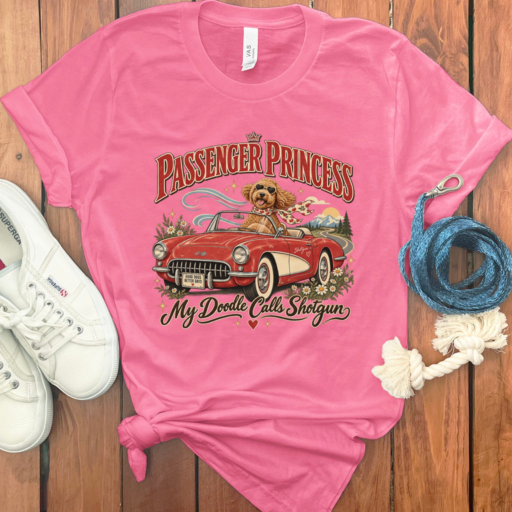 Pink t-shirt with "Passenger Princess" and "My Doodle Calls Shotgun" text graphics.