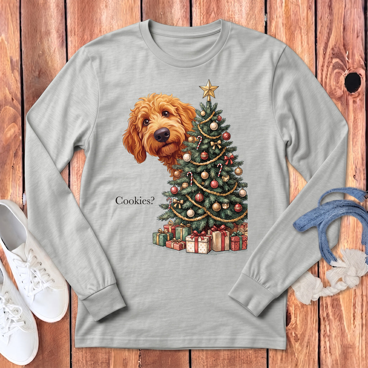 Light gray long-sleeve shirt with a doodle dog peeking behind a decorated Christmas tree.