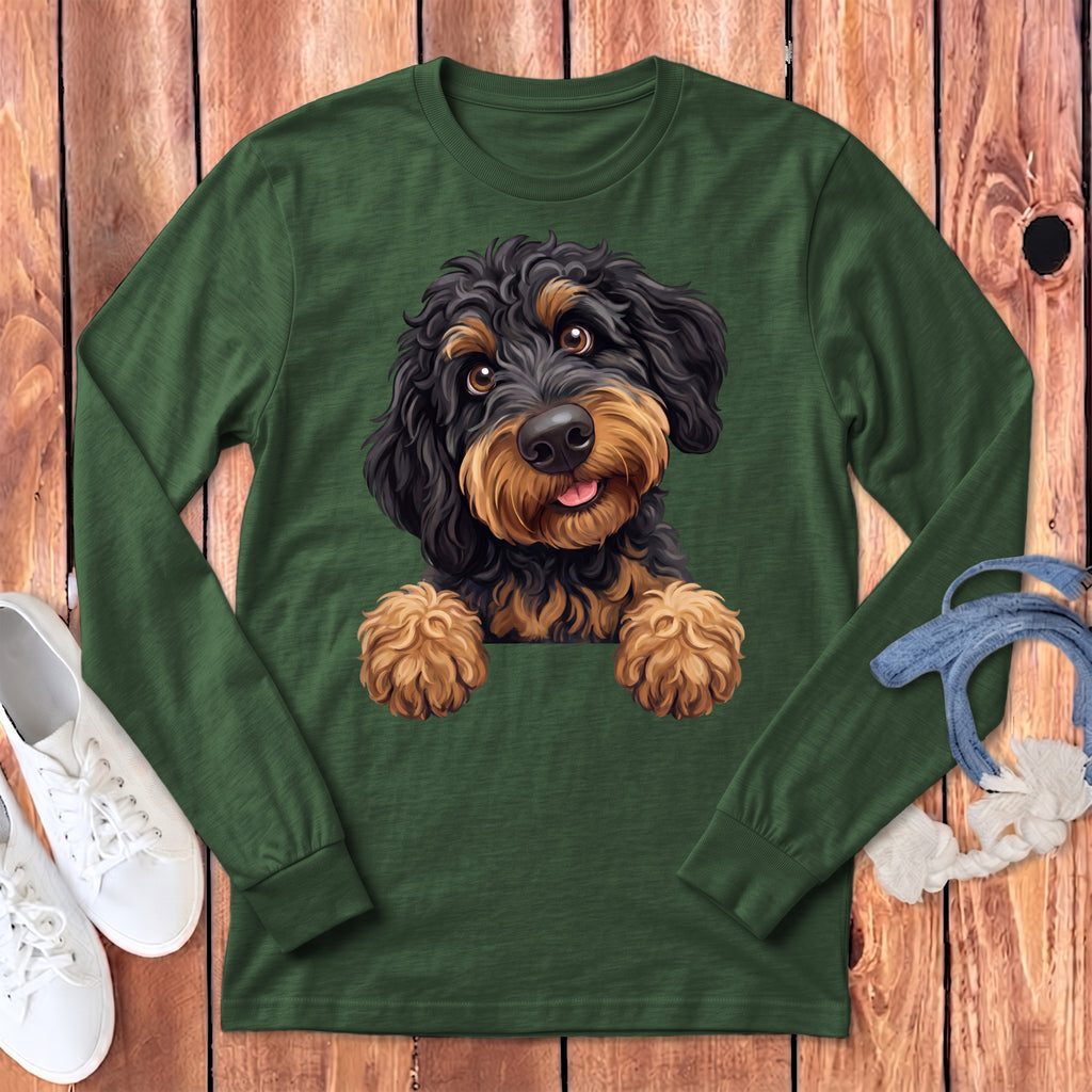 Green long sleeve shirt with a black and tan doodle dog illustration.