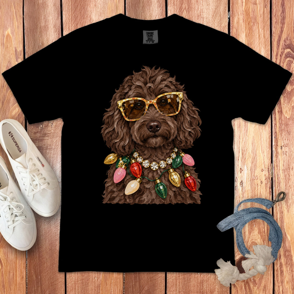 Black t-shirt with brown dog wearing sunglasses and a Christmas light necklace.