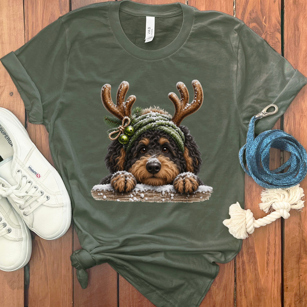 Green t-shirt with a Christmas-themed Bernedoodle dog graphic.