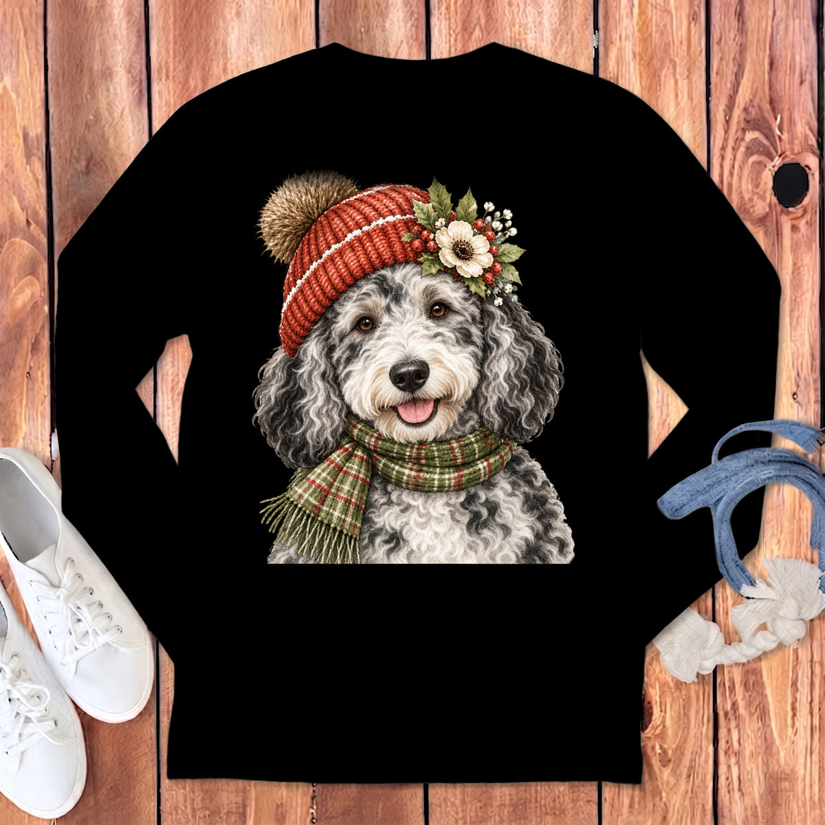 Black t-shirt with a doodle dog wearing a beanie, scarf, and floral accents.
