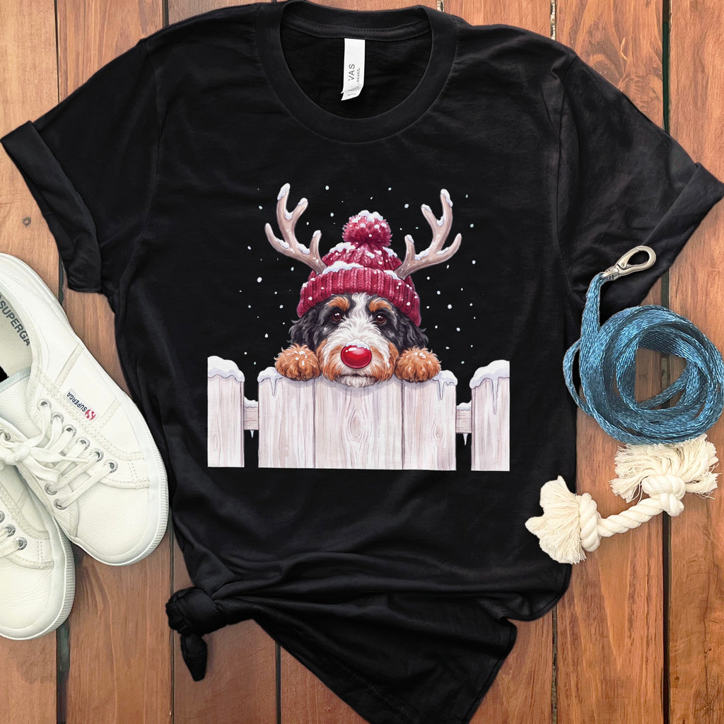 Black t-shirt featuring a Bernese Mountain Dog wearing a Rudolph nose and reindeer antlers.