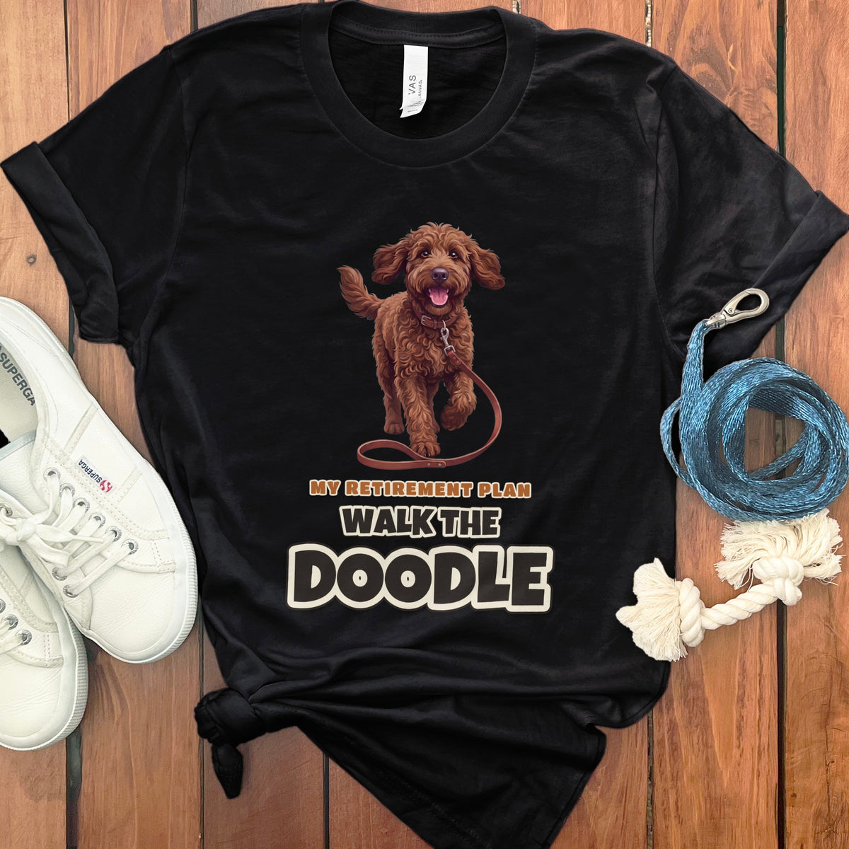 Black t-shirt with brown doodle dog graphic and text "MY RETIREMENT PLAN WALK THE DOODLE".