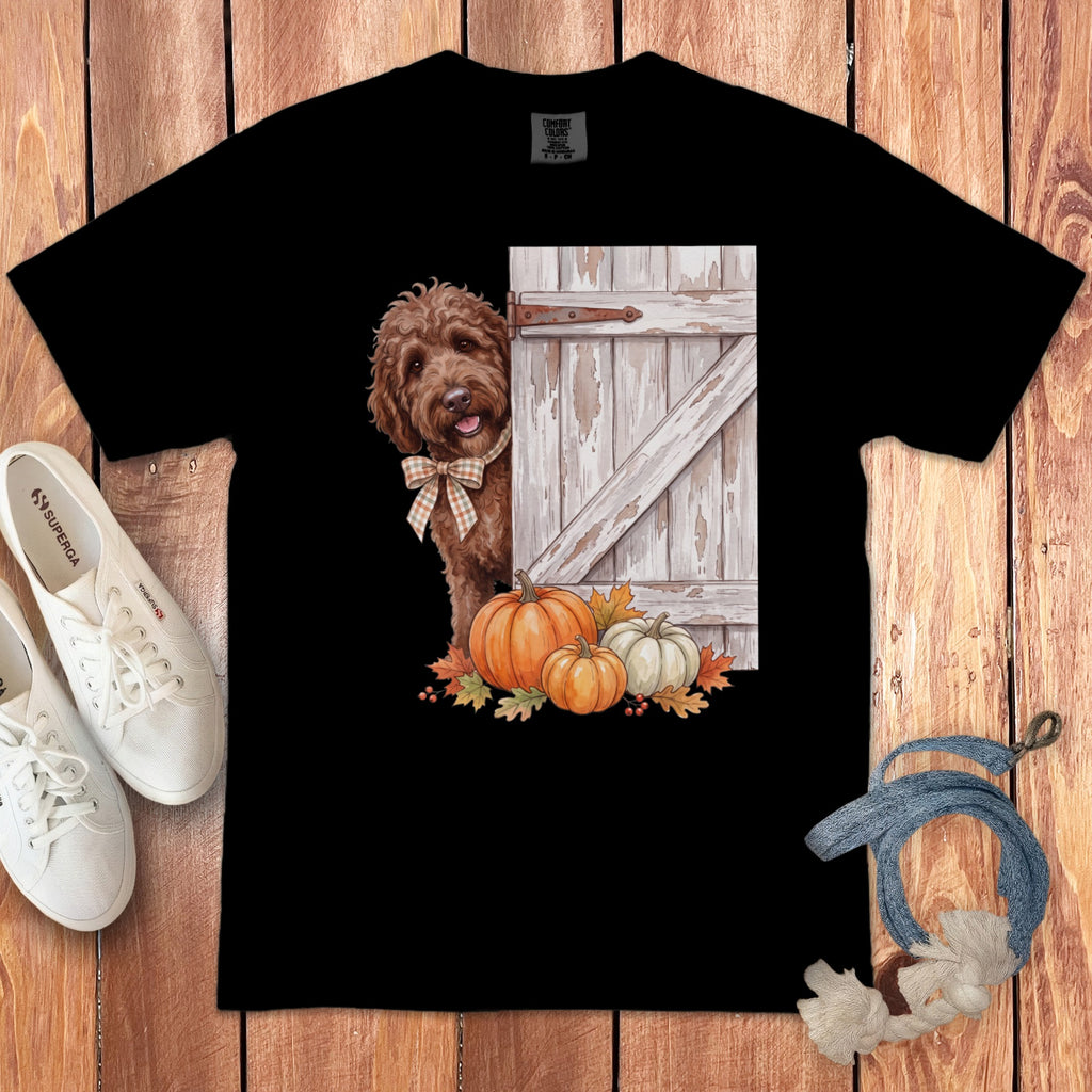 Black t-shirt with dog, barn door, pumpkins, and fall leaves graphic.