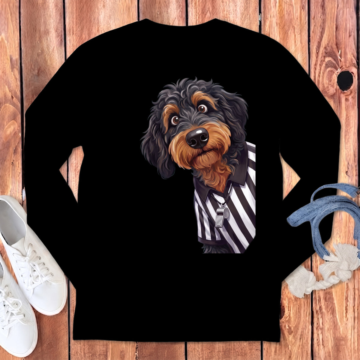 Black long-sleeve shirt with a cartoon dog wearing a referee shirt and whistle.