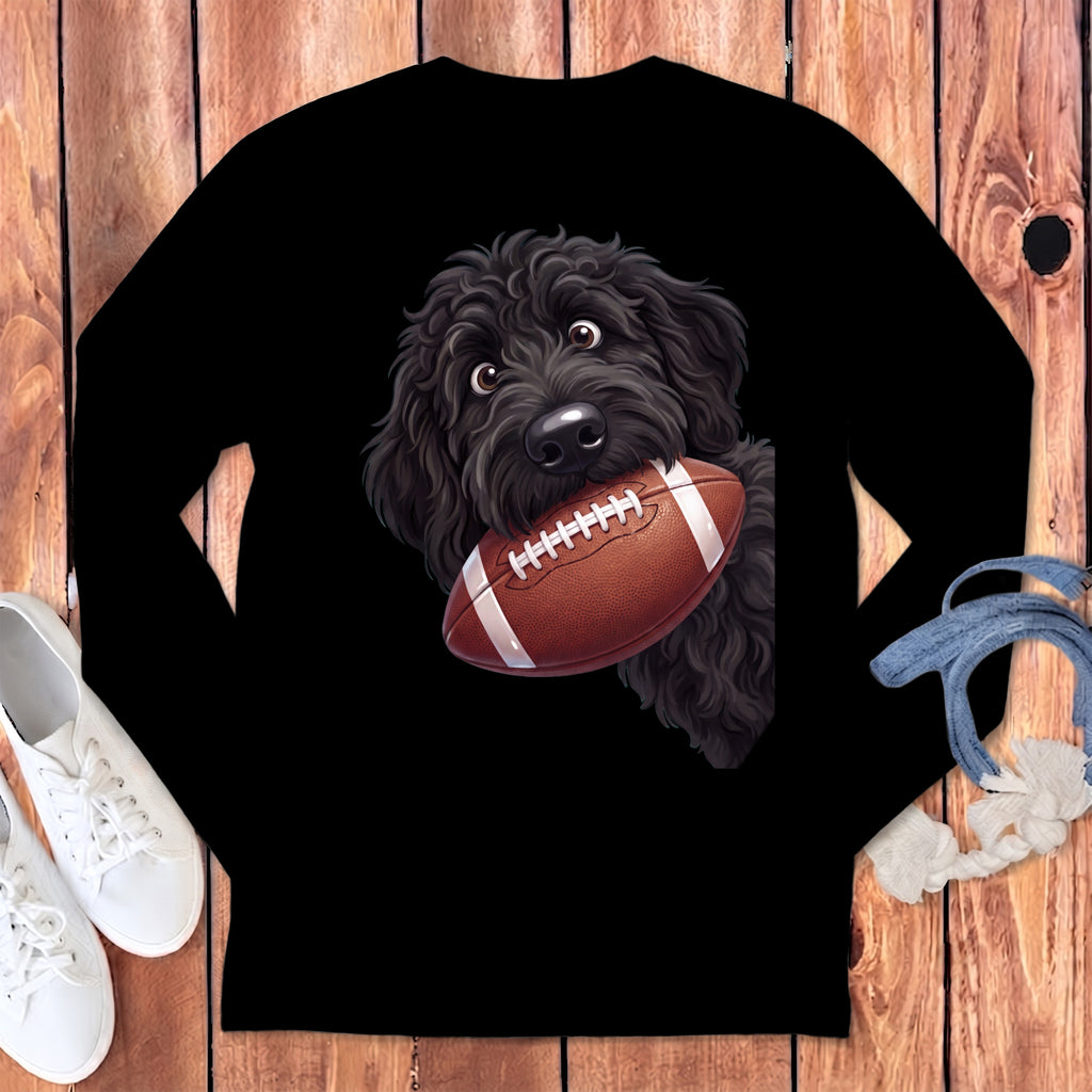 Black long-sleeve shirt with a fluffy black dog holding a football.