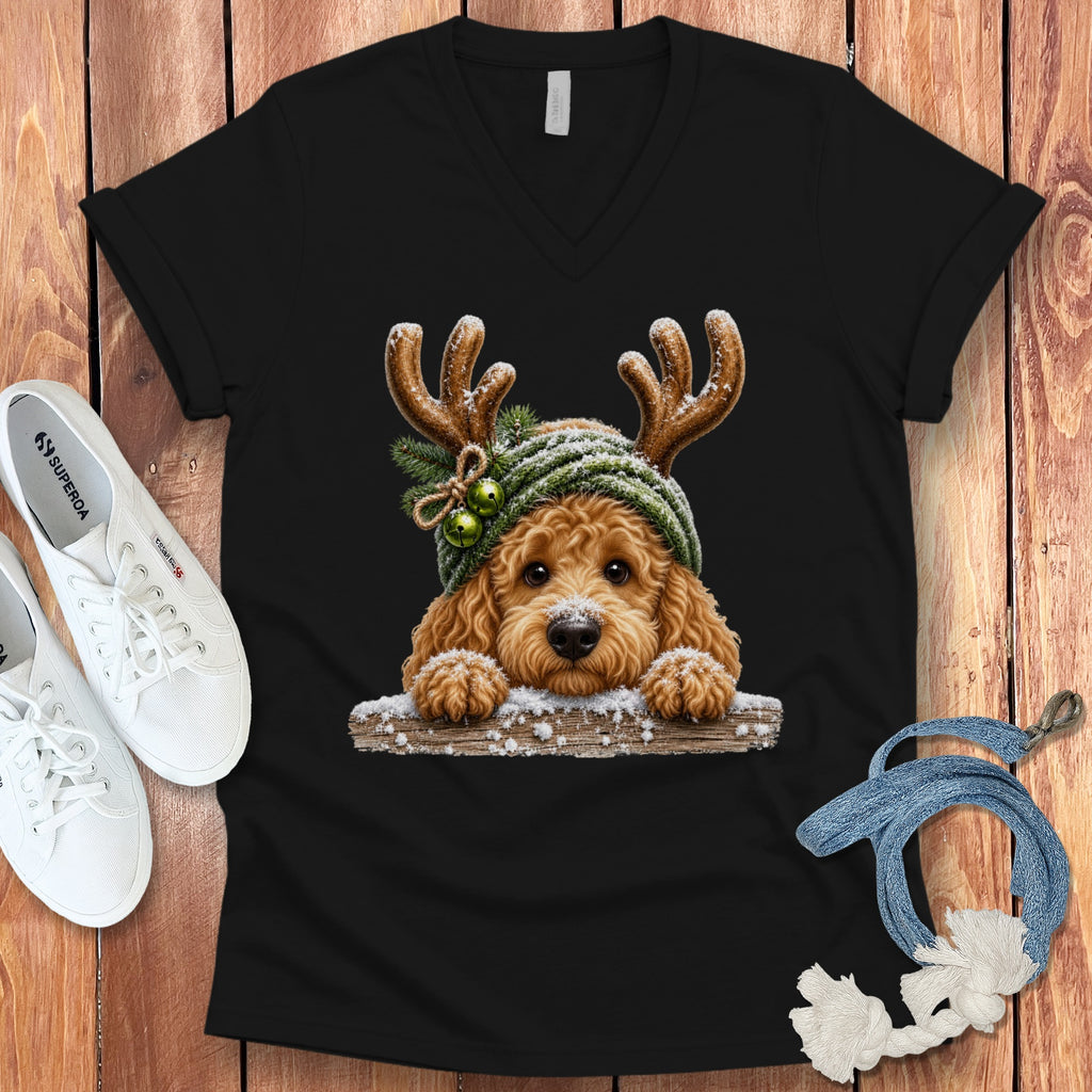 Black t-shirt with a cartoon dog wearing reindeer antlers and a green knit hat.