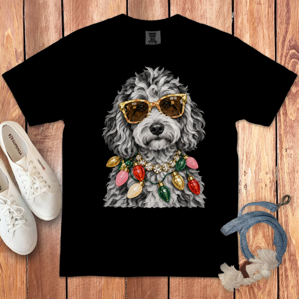 Black t-shirt with a fluffy dog wearing sunglasses and a string of Christmas lights.