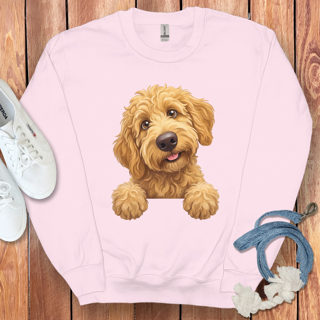 Pink sweatshirt with a playful doodle dog graphic and Gildan Softstyle tag.