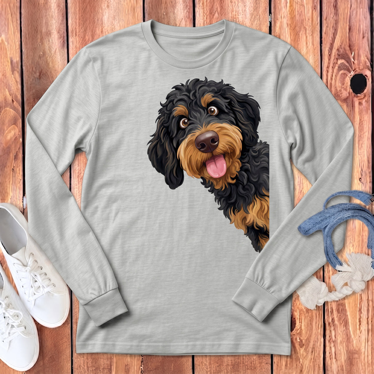 Light grey long-sleeve t-shirt featuring a cartoon doodle dog with black and tan fur.