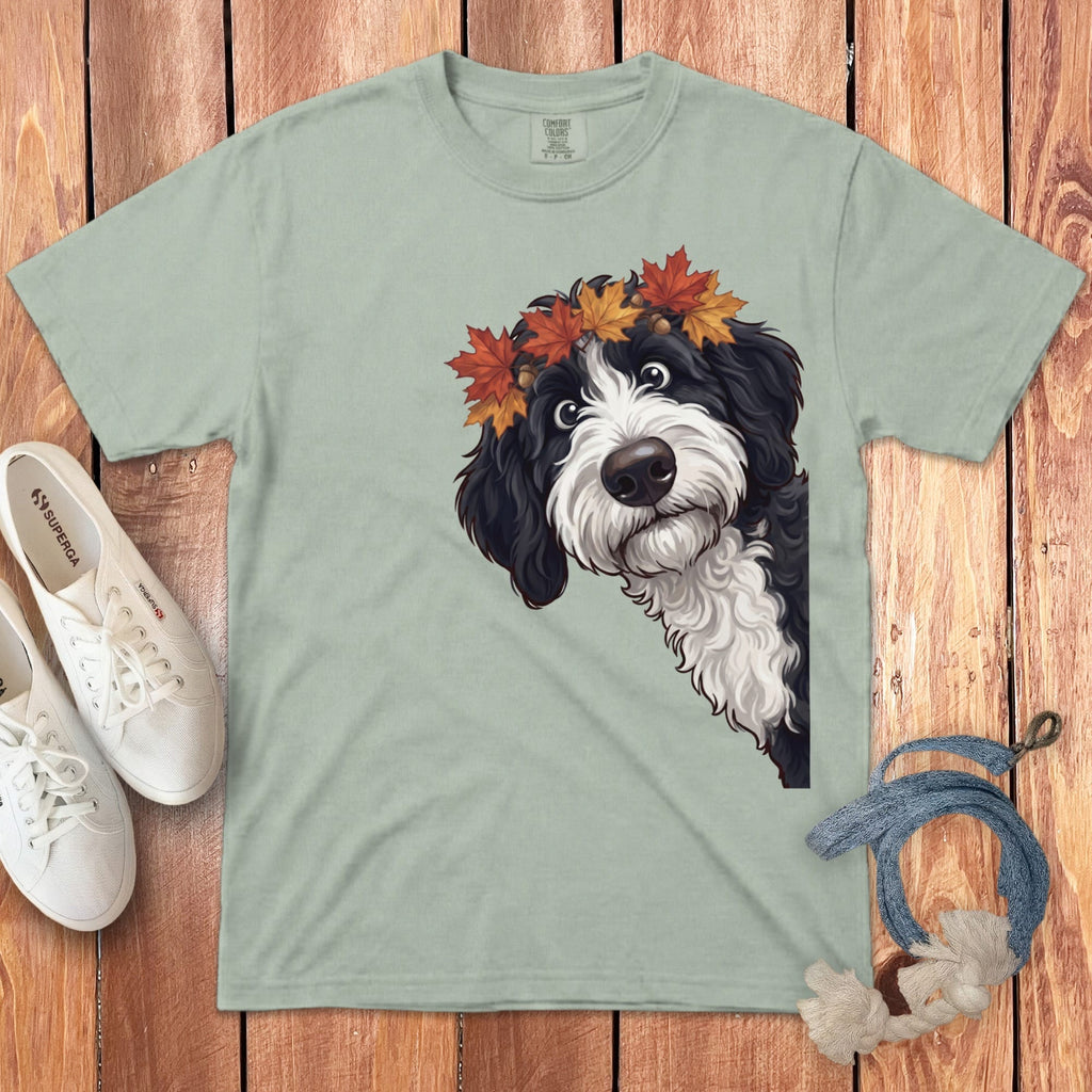 Light green t-shirt with a drawing of a dog wearing a fall leaf crown.