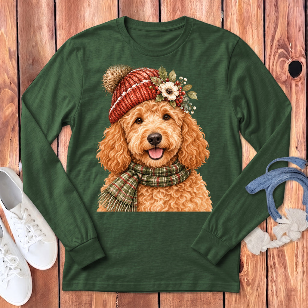Green long-sleeve shirt with a watercolor doodle wearing a festive hat and scarf.