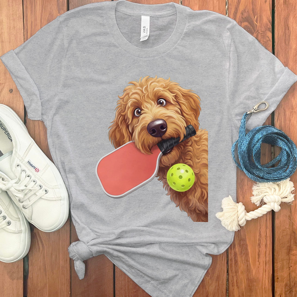 Apricot Goldendoodle Pickleball T-Shirt in Athletic Heather / S by Puppy Jo