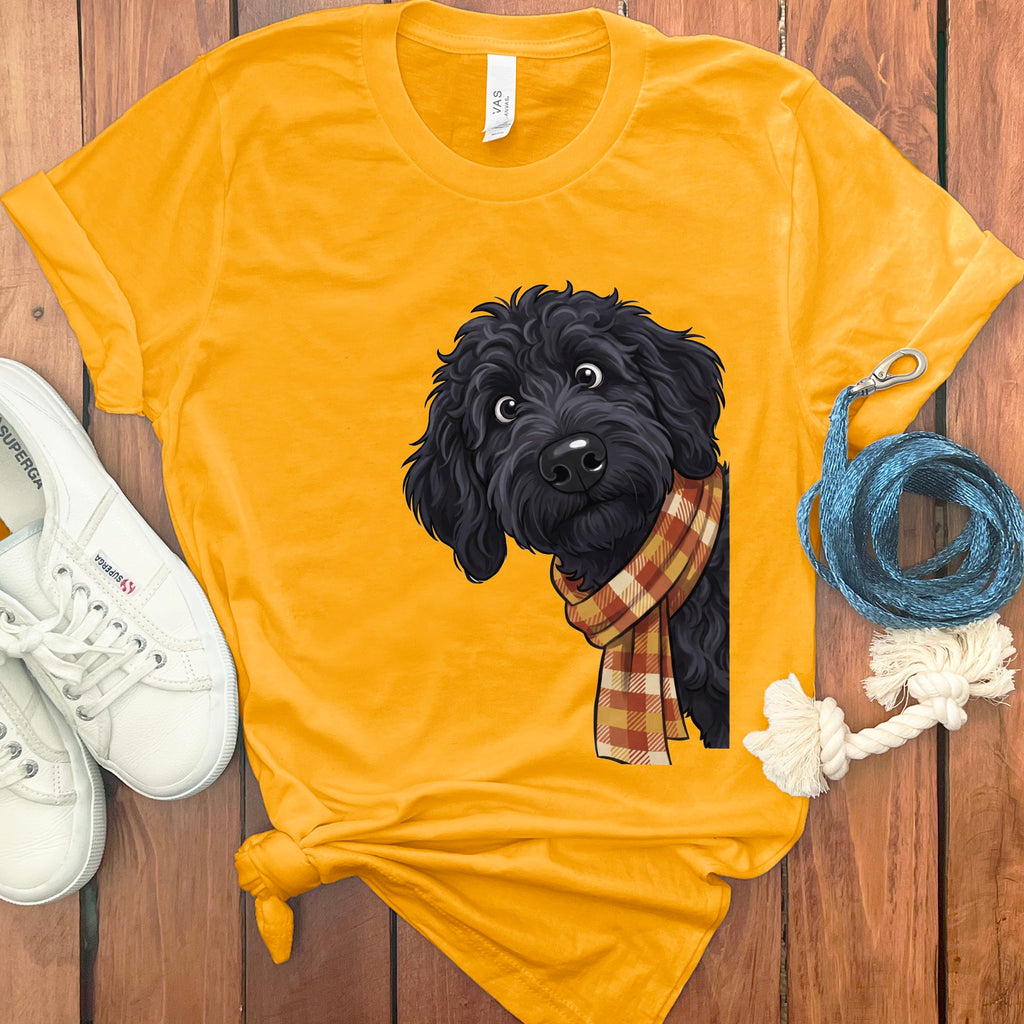 Yellow t-shirt with a black dog wearing a plaid scarf graphic.