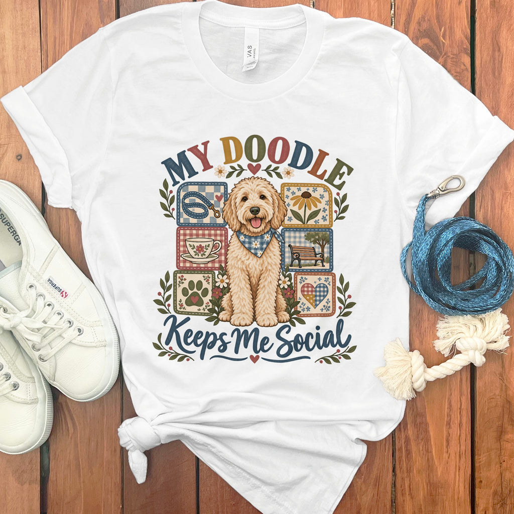 White t-shirt with "My Doodle Keeps Me Social" and a doodle dog surrounded by checkered squares.