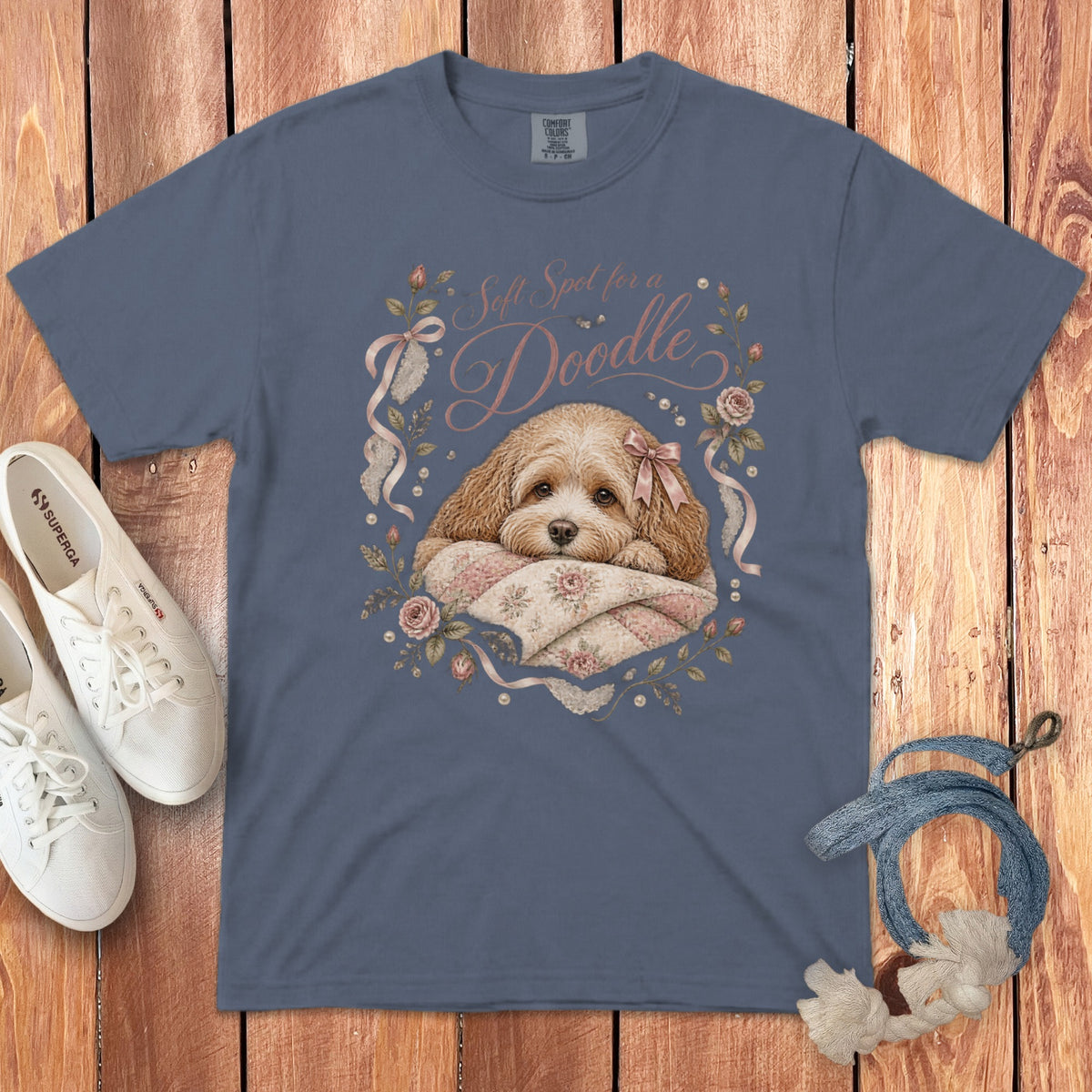 Blue t-shirt with a doodle dog illustration and text "Soft Spot for a Doodle".